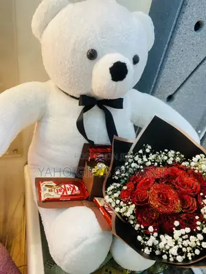 Photo - White Teddy Bear And Other Gift Stuff