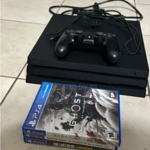 Photo - Playstation 4pro Brand New Adis New With 2 Original Joystick