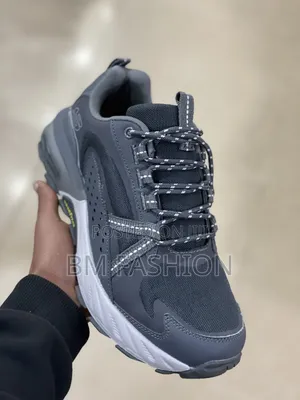 Photo - Skechers Max Protect Trainers-Ultimate Comfort