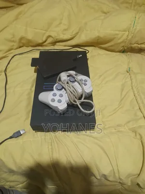 Photo - Ps2 Orginial With 1tb HDD and 36 Games Installed