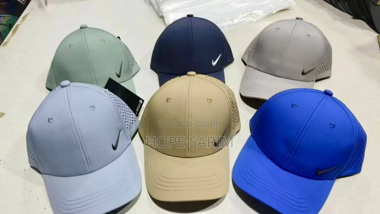 Nike Hats በከለር
