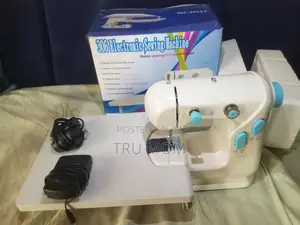 Photo - Mini Electronic Sewing Machine