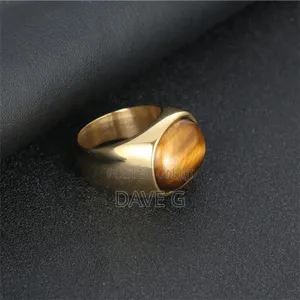 Gold-Tone Signet Ring With an Oval Tiger's Eye Gemstone