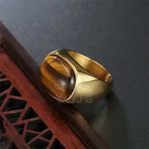 Gold-Tone Signet Ring With an Oval Tiger's Eye Gemstone