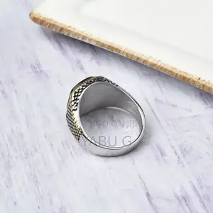 A Men's Vintage-Style Ring Featuring a Rectangular Red a Gold-Plated