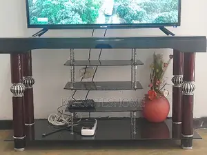 Elegant Black and Brown Glads Tv Stand - Very Good Condition