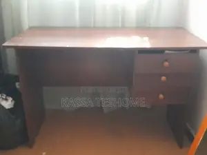Photo - Brown Wooden Study Table With Grey Chair