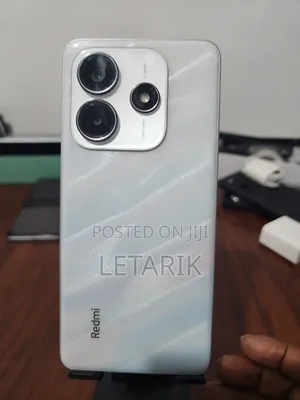 Photo - New Xiaomi Redmi Note 14 128 GB Red