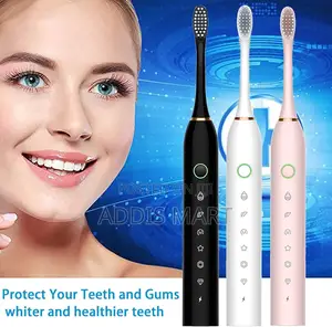 Photo - Electric Toothbrush With 8 Brush Heads,