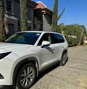 Photo - Toyota Grand Highlander Hybrid 2025 White