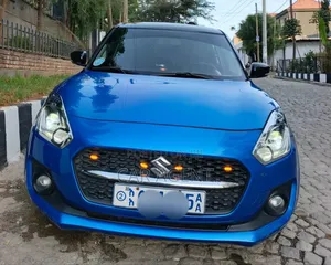 Photo - Suzuki Swift 2023 Blue