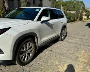 Photo - Toyota Grand Highlander Hybrid 2025 White