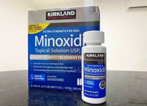 Photo - Kirkland Minoxidil 5% የፀጉር እና የፂም ማብቀያ 5%
