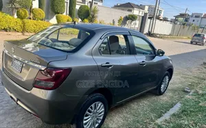 Photo - Suzuki Dzire 2021 Brown