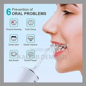 Photo - 4in1 Teeth Cleaner Flosser