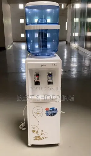 Photo - Enzo Water Dispenser 20 Liter የውሃ ማጣሪያ ከስርም የራሱ ኩባያና ብርጭቆ መደርደሪያ አለው