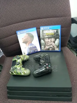 Photo - Playstation 4pro With 2joystick and Call Duty Wwii Games