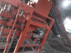 Photo - የብሎኬት ማሽን Block Macking Machine