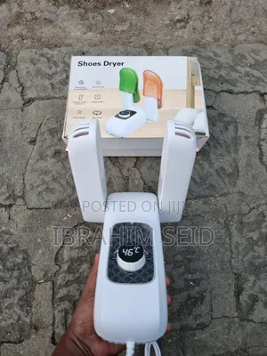 Photo - Shoe Dryer Heater Dehumidifier Sterilizes Odor