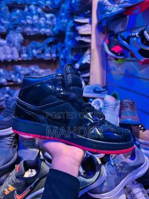 Photo - Jordan 1 Boots With One Shoe Protector