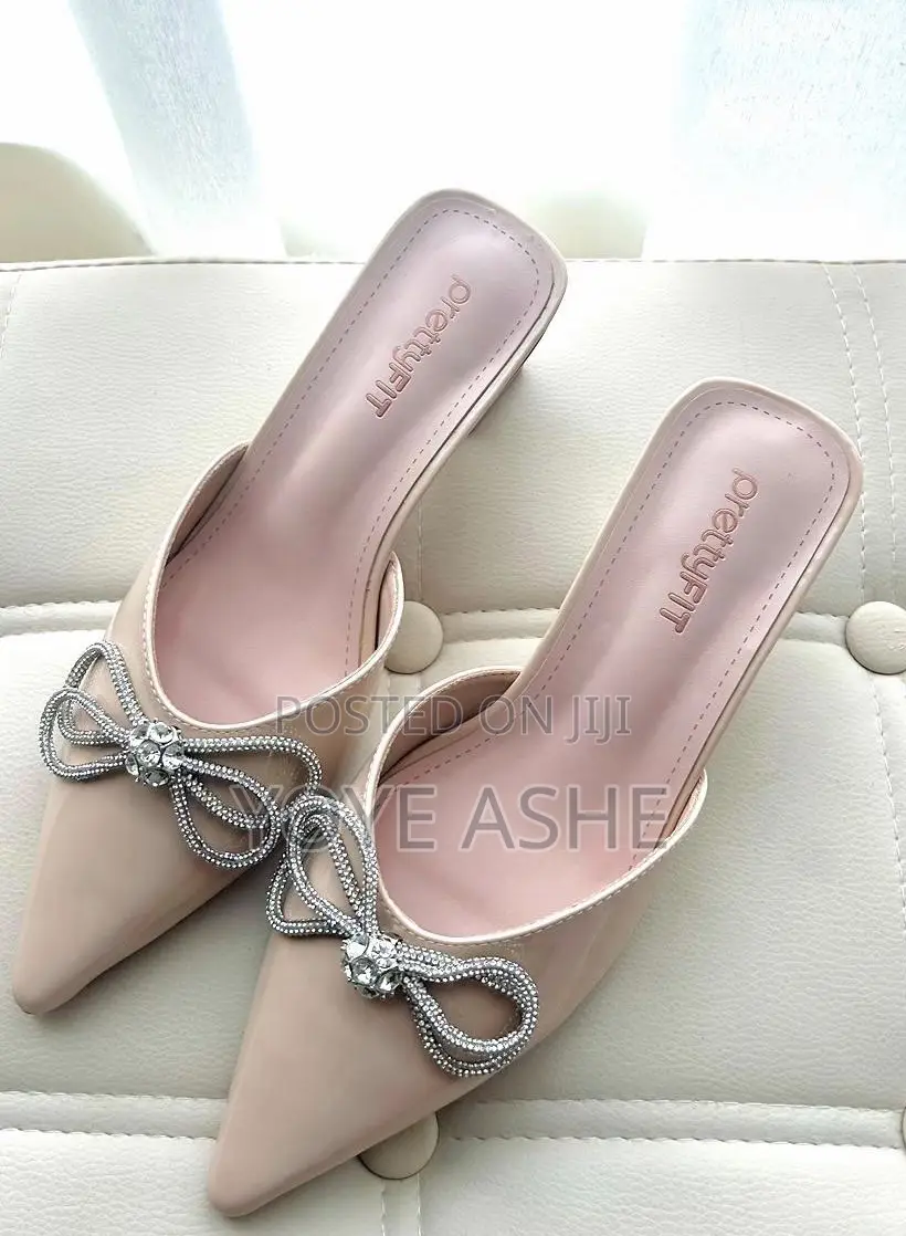 Pointed-Toe Mule Shoe.