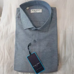 Photo - Men’S Light Blue and Dark Blue Long-Sleeve Button-Up Shirt