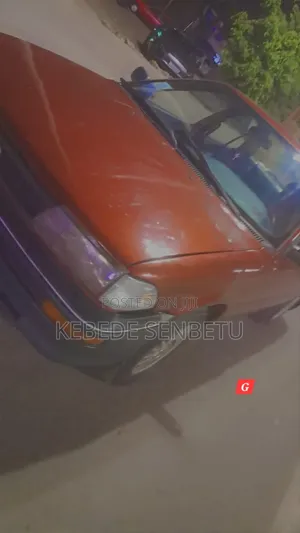 Photo - Toyota Corolla Sedan 1992 Burgundy