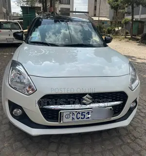Photo - Suzuki Swift 2023 White