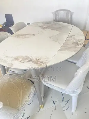 የሚሰፉና የሚጠብ(Extendable) Dining Table