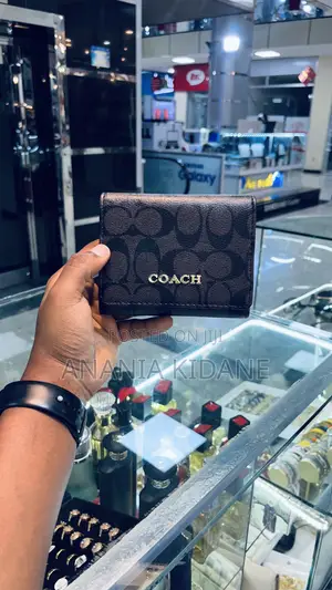 Photo - Original Leather Coach Mini Wallet