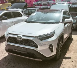 Photo - New Toyota RAV4 Hybrid 2024 White