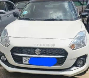 Photo - Suzuki Swift 2022 White