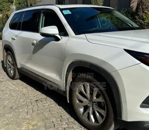 Toyota Grand Highlander Hybrid 2025 Beige