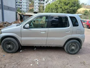 Photo - Suzuki Kei 2001 Silver