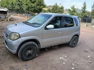 Photo - Suzuki Kei 2001 Silver