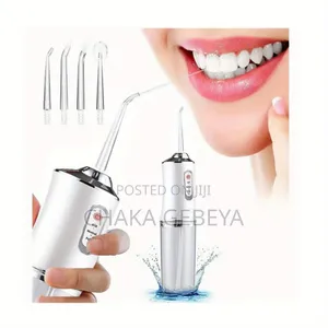 Photo - 4-in-1 Rechargeable Water Dental Flosser