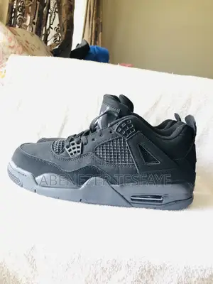 Photo - Jordan 4 Black Cat