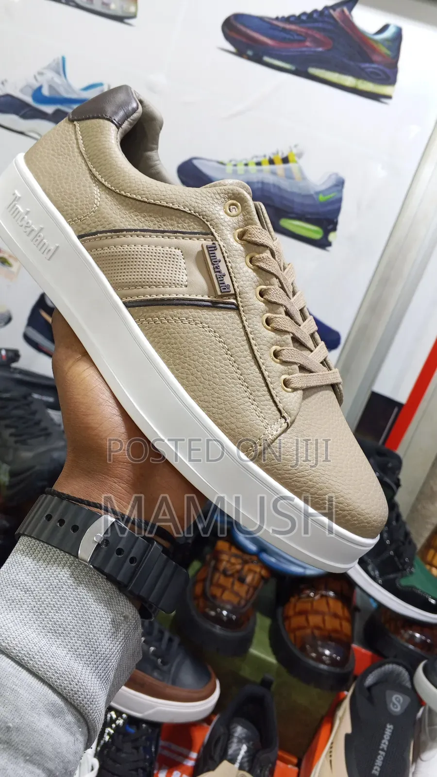 This Is Apaire of Timberland Sneakers With Amulticoloerd Shoes