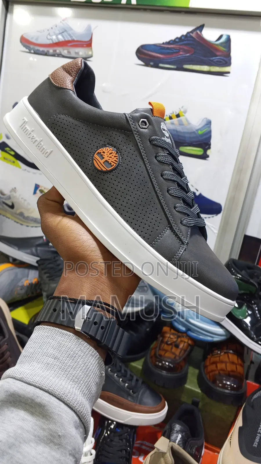 This Is Apaire of Timberland Sneakers With Amulticoloerd Shoes