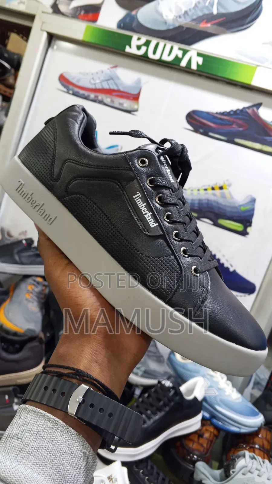 This Is Apaire of Timberland Sneakers With Amulticoloerd Shoes