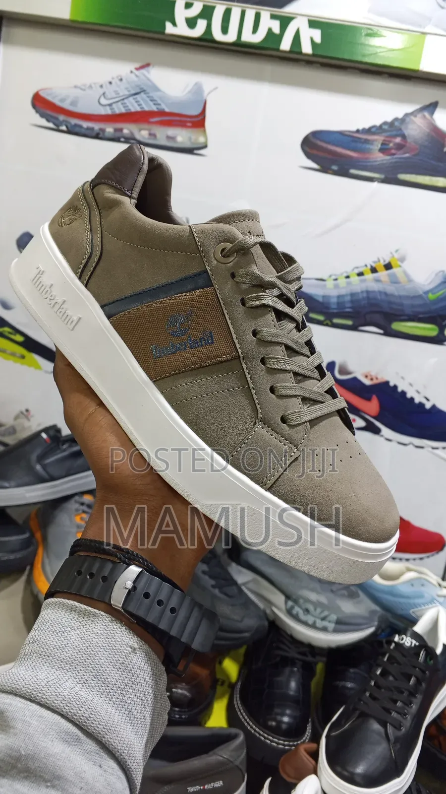 This Is Apaire of Timberland Sneakers With Amulticoloerd Shoes