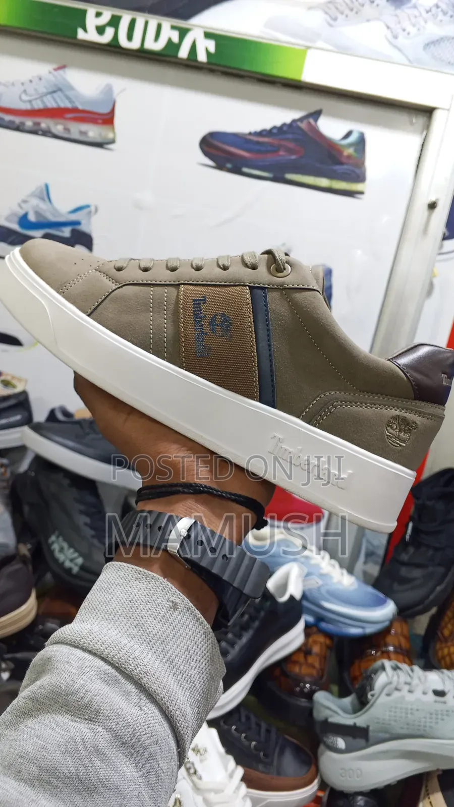 This Is Apaire of Timberland Sneakers With Amulticoloerd Shoes