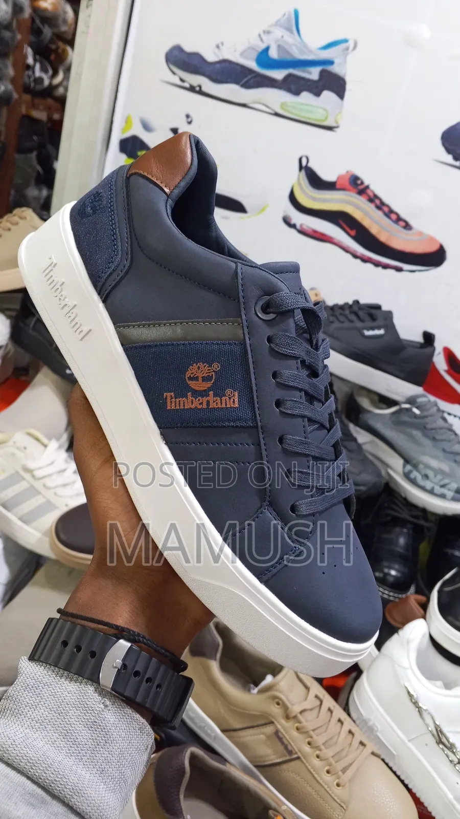 This Is Apaire of Timberland Sneakers With Amulticoloerd Shoes