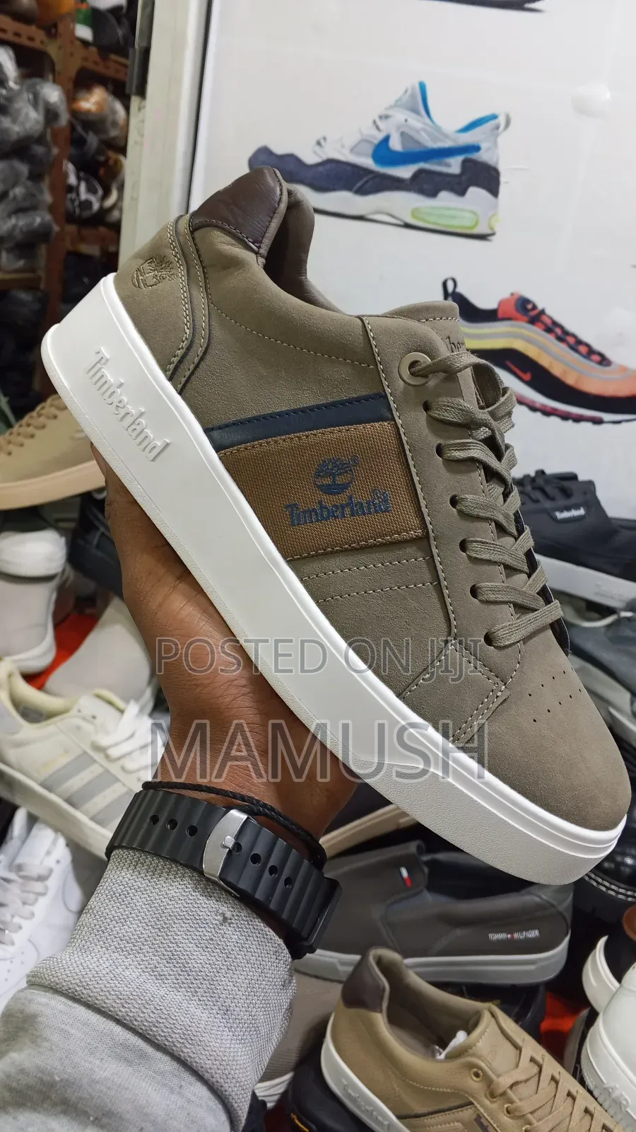 This Is Apaire of Timberland Sneakers With Amulticoloerd Shoes