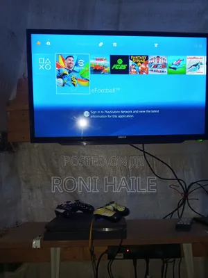 Photo - Ps 4 and 32 Inche Tv