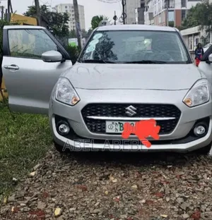 Photo - Suzuki Swift 2021 White