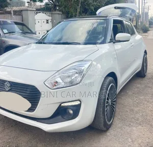 Photo - Suzuki Swift 2020 White