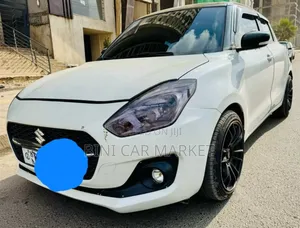 Photo - Suzuki Swift 2021 White