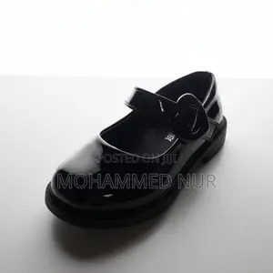 Photo - Classic Black Kids Shoes – Glossy Finish, Timeless Style