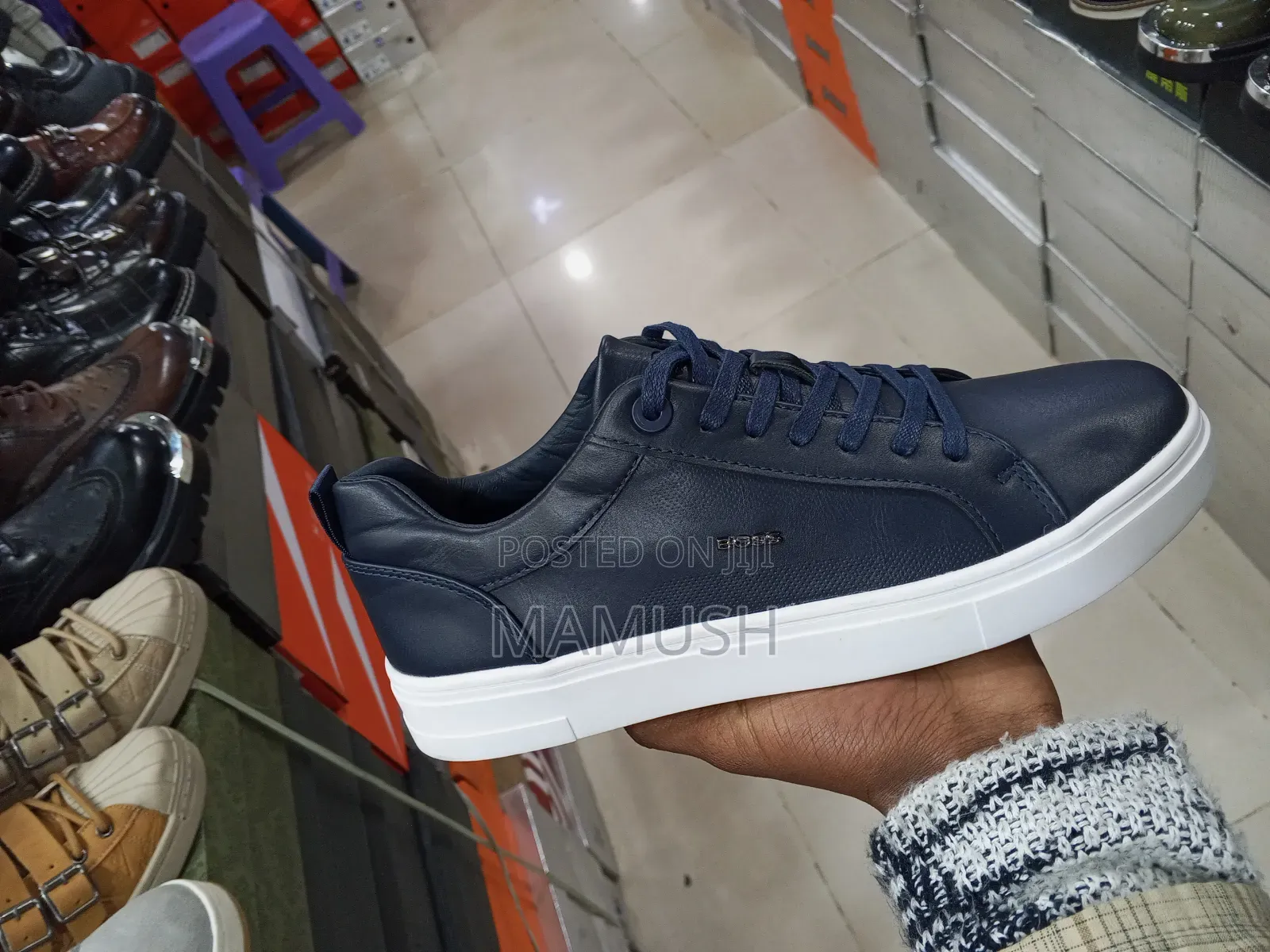 This Paire of Boos Sneakers in Amulticolord